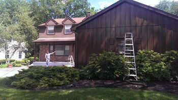 Roof painting in Gloucester City, New Jersey by Pete Jennings & Sons